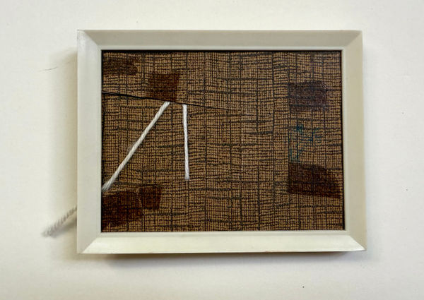 Plastic Frame with Line of Yarn