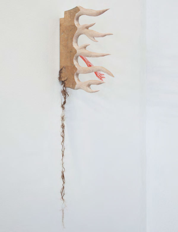 translation (...under the, under the porch of the house? At the last moment... It... yelps. As if it’s seen something real.)