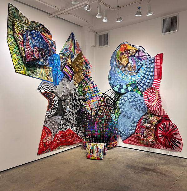 Lisa Hoke Lucky Lights, 2024 cardboard, packaging, wire, felt, wood, mixed materials 126 x 44 x 36 in.