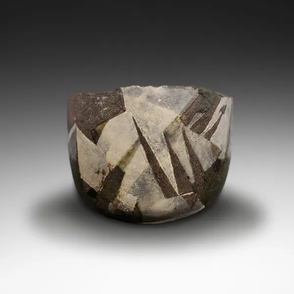 Round teabowl with abstract geometric patterning in white and brown glazes