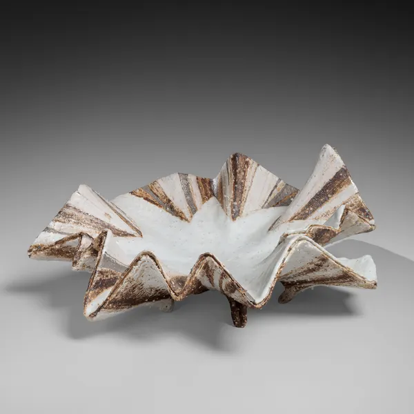 Shell-shaped vessel
