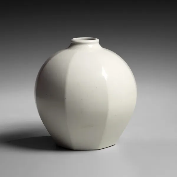 TOMIMOTO KENKICHI, Faceted white porcelain vessel with narrow, upraised neck, 1932