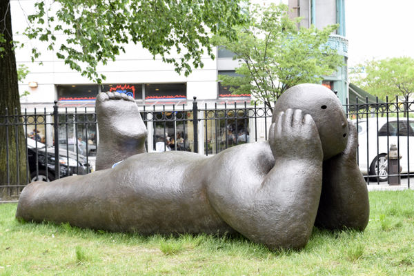 Joy Brown, recliner with head in hands, 2016