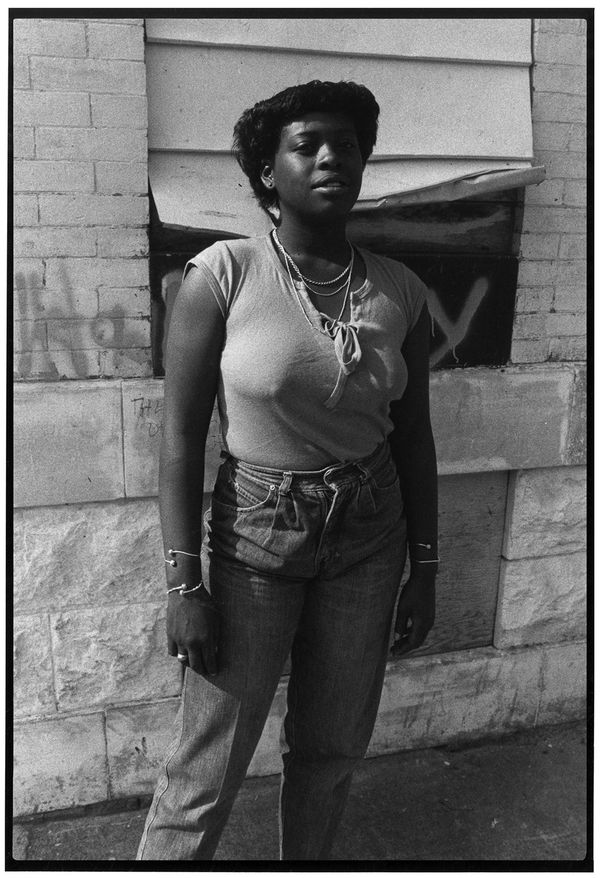 Steven Cuffie Untitled (Woman Standing on Sidewalk), c. 1970s Gelatin silver print