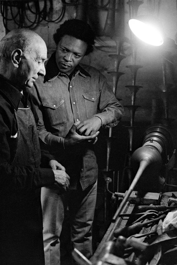 Alf Kumalo, A young Hugh Masekela with trumpet maker, c.1960s, printed 2025