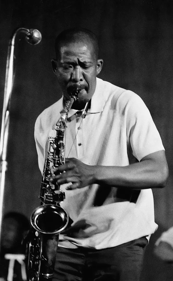 Alf Kumalo, Kippie Moeketsi with saxophone, c.1970s