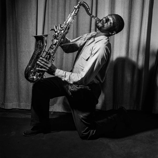 Bob Gosani, Wilson 'King Force' Silgee with saxophone, 1954