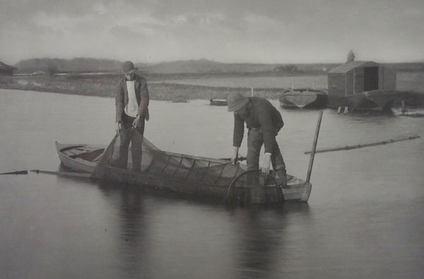 P. H. Emerson, From Life and Landscape on the Norfolk Broads, Taking up the Eel-Net, 1886