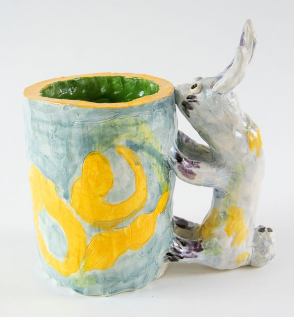 A much with a hare as the handle by artist Reniel Del Rosario.