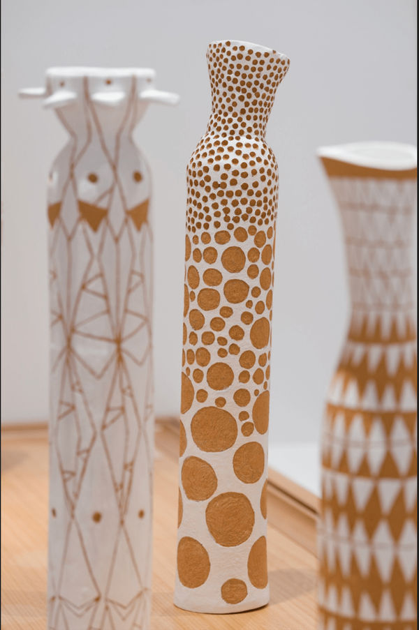 A decorative ceramic Aboriginal pole