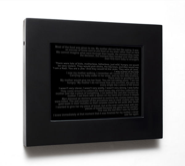 Still image of video of grey text on a black background in a black frame.