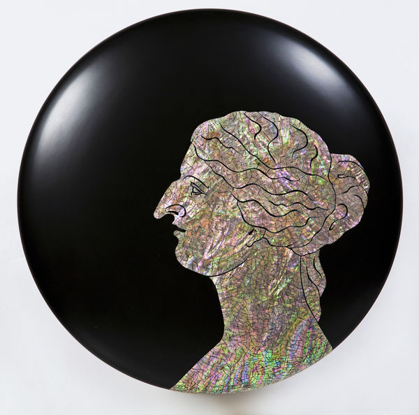 Side profile of a woman's head with multi-colored rainbow skin and hair, and a pointy hooked nose.