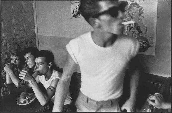 Bruce Davidson, Brooklyn Gang (boys sitting at table, one standing with cigarette), 1959