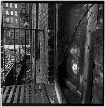 Bruce Davidson, Children Looking Out of Chicken Wire Window, 1966-68