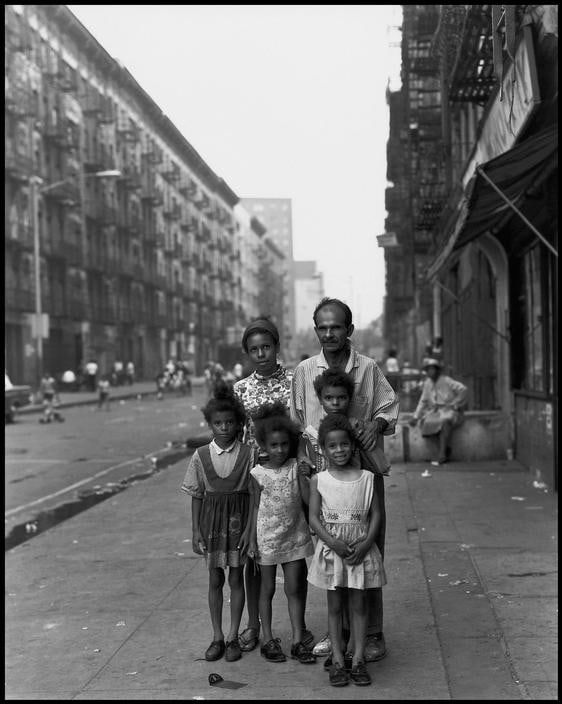 Bruce Davidson, East 100th Street (family on sidewalk), 1966-68