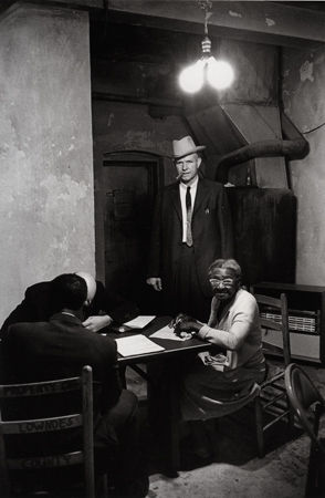 Bruce Davidson, Untitled [man in cowboy hat under lights, elderly woman seated], Voter Registration, Alabama, A Time of Change, 1965