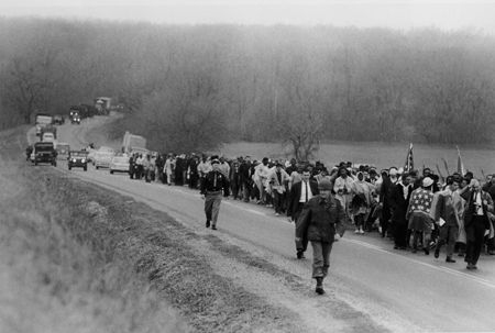 Bruce Davidson, Untitled [long column of marchers, jeeps], Selma March, A Time of Change, 1965
