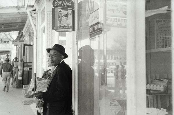 William Eggleston, Untitled, (man and Chesterfield sign), 1960-1972