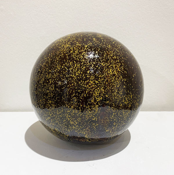 Clare Flatley Planetary Bodies III, 2021 Stoneware, iron glaze 20 cm diameter