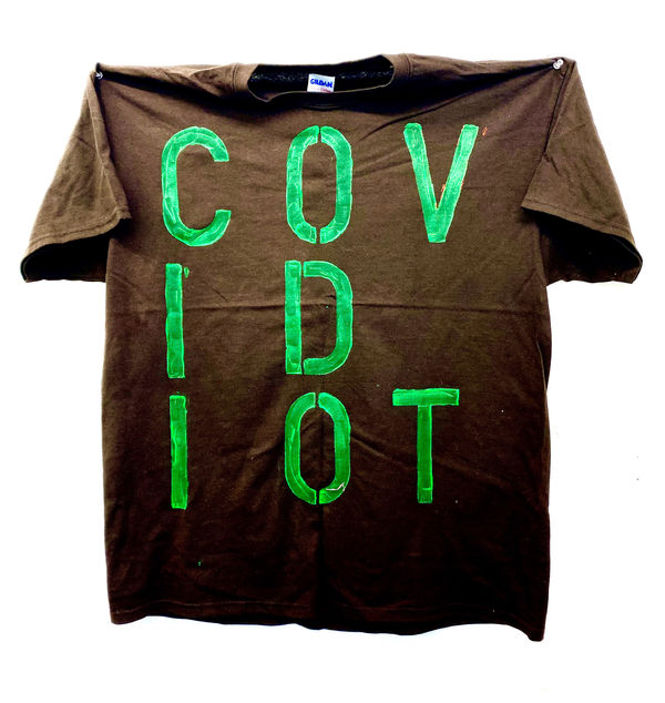 Ross Sinclair RSA (Elect) Covid Comms 6 - Covidiot, 2021 Hand-stencilled fluorescent acrylic on cotton t-shirt From the ongoing series T-shirt Paintings 1993 - Signed on reverse 62 x 70 cm