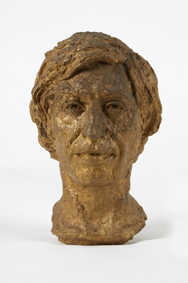 Benno Schotz RSA Amiel, the sculptor's son, 1979 Plaster bust [ochred} 40 H x 24 W x 28 D cm