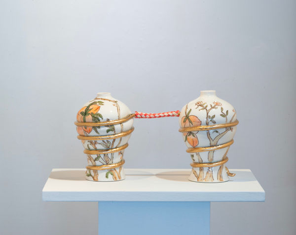 Jennifer Ling Datchuk Take It Easy, 2023 Porcelain, bamboo finger trap and gilded 10 x 7 x 7 in (each vase) 25.4 x 17.8 x 17.8 cm (each vase)