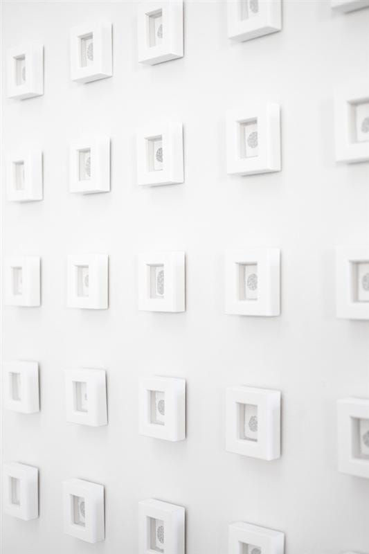 Clare Kim Untitled installation, 2011 Handwritten text in ink on paper, installation of 196 framed pieces, dimensions variable (installed at Auckland Art Fair at 3000mm x 2700mm)