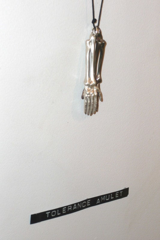 Josephine Cachemaille Tolerance amulet, 2009 Silver& cotton cord