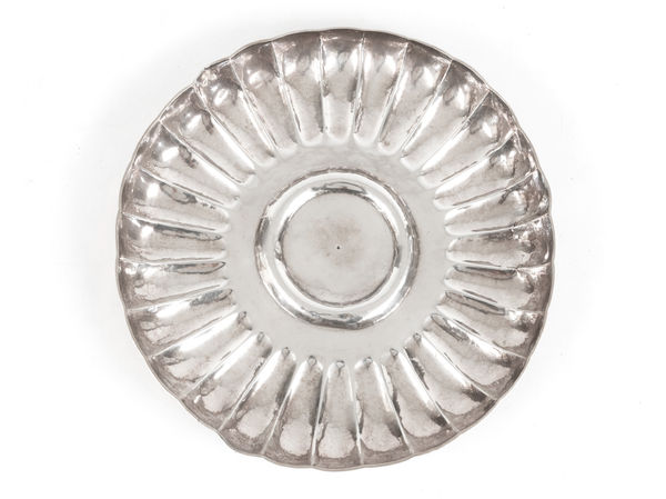 Manuel Soares Ferreira A Portuguese gadrooned salver from the collection of the Emperor of Abyssinia, Portugal, 1721–1750 portuguese silver 4.0 × 32.5 ×32.5 cm 392.0 g Oporto assay-mark for João do Couto de Azevedo (1703–1768); Goldsmith mark mf for Manuel Soares Ferreira