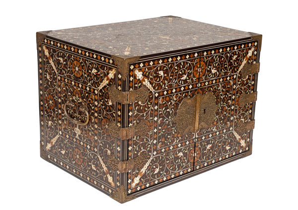 An Indo-Portuguese Thane two-door cabinet, Northern Province of the Portuguese State of India, Thane?; 1550–1600 teak, ebony, rosewood, sandalwood, ivory, bone, brass, iron and gilt copper 49.0 × 36.0 × 35.5 cm