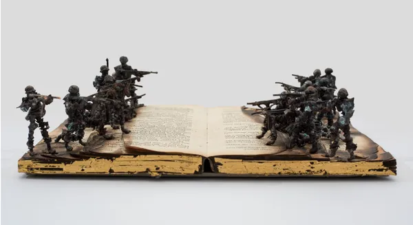 Kingsley Gunatillake Noperalena Pitu 8, 2026 Old Book, Gold Leaf and Copper Figures 18 x 22 x 6 cm 7 1/8 x 8 5/8 x 2 3/8 in