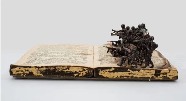 Kingsley Gunatillake Noperalena Pitu 7, 2026 Old Book, Gold Leaf and Copper Figures 18 x 22 x 6 cm 7 1/8 x 8 5/8 x 2 3/8 in