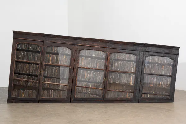 Kingsley Gunatillake Altered Books, 2026 Wood, Old Books and Copper Figures