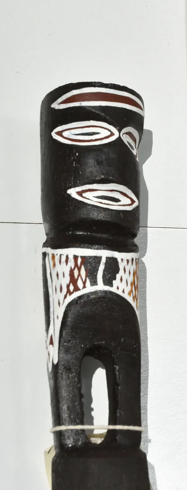 Buku Carving Carving, 2021 natural pigment on wood 25 x 6 cm