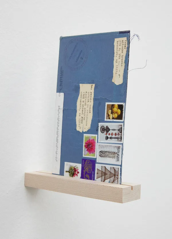 Mitsuko Brooks ARIGATO (mail to Yoshie Sakai postmarked September 20, 2020), 2020 Discarded book cover, watercolor, paper, stamps, typewriter ink 7 3/4 x 4 3/4 inches 19.7 x 12.1 cm