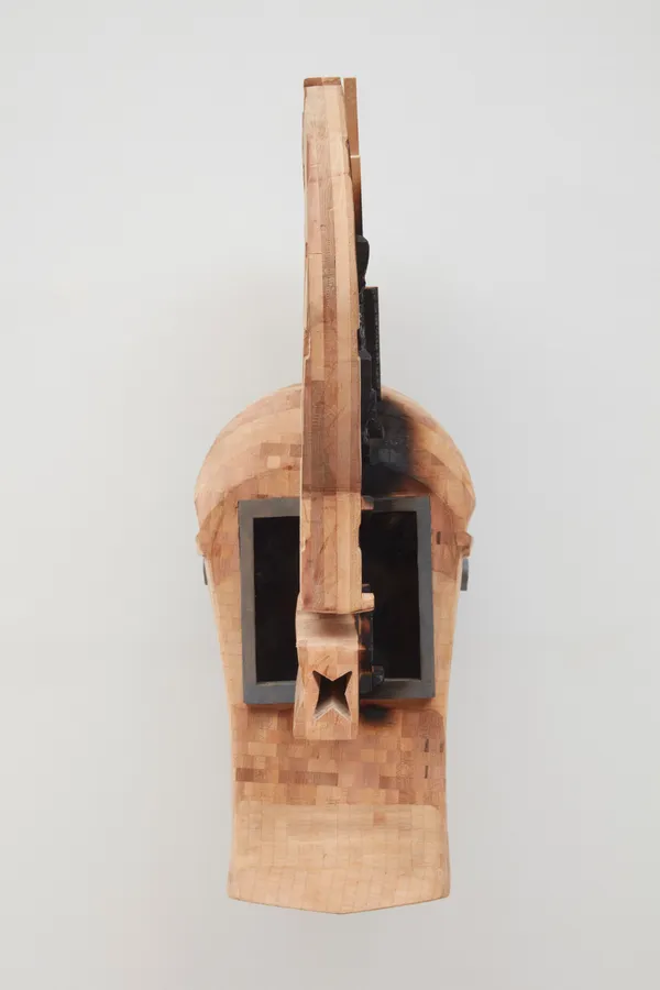Yashua Klos Kifwebe Welding Mask 2, 2022 Stained and charred wood, Plexiglas 29 1/2 x 10 x 21 1/4 inches 74.9 x 25.4 x 54 cm