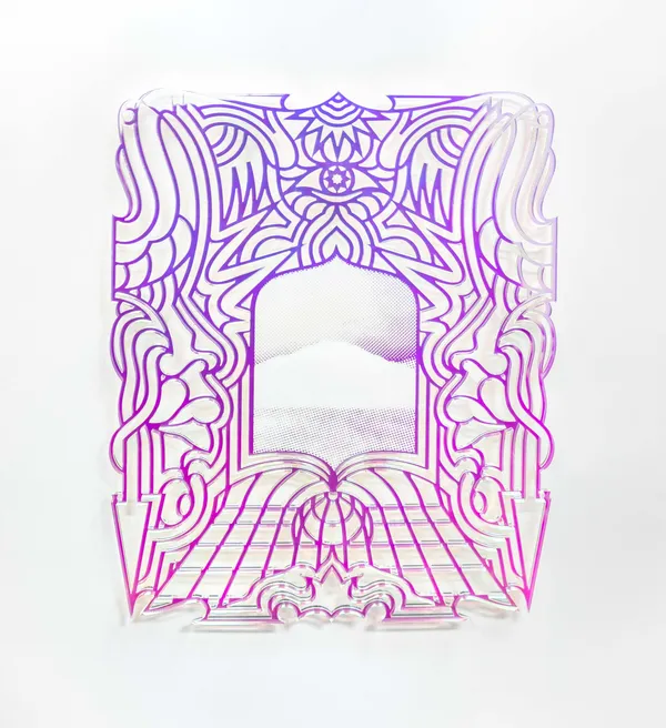 laser-cut transparent acrylic plaque with iridescent film with a design featuring a an eye, arrows, a sun and flowers.