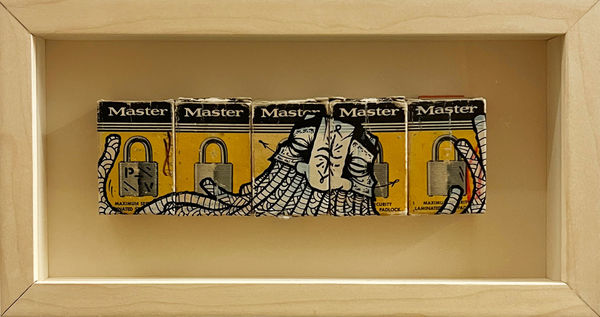 five padlock boxes pushed together and painted with GATS mask