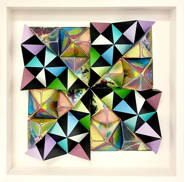 Sean Newport's piece with multiple hand cut wood shapes in various colors