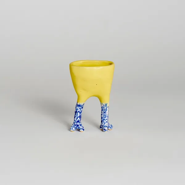 Courtney Krings yellow vase with blue legs