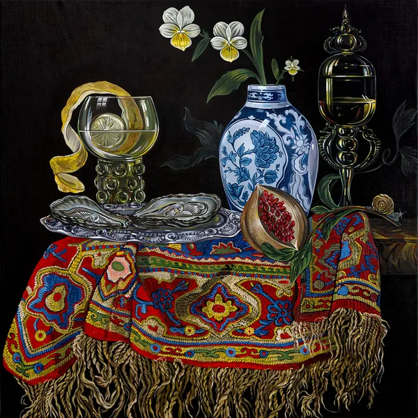 Still life oil painting of a small tablescape featuring oysters, pomegranate and an ornate glass with a peeled lemon against a black background by Sabrina Bockler