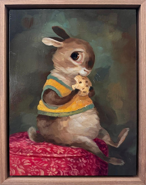 A painting of a bunny wearing a yellow sweater while eating a cookie.