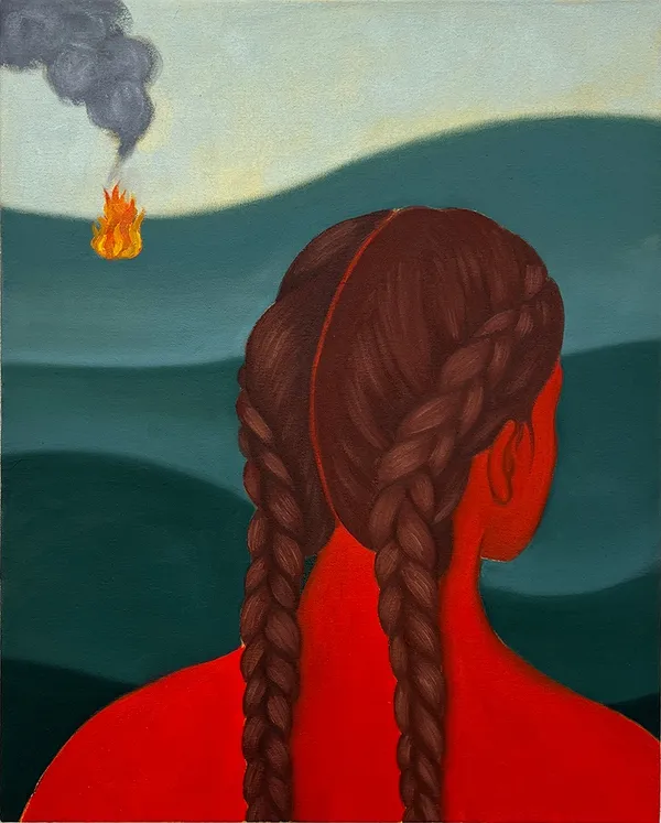 back of the head of a woman with braided hair, a fire burning in the distance