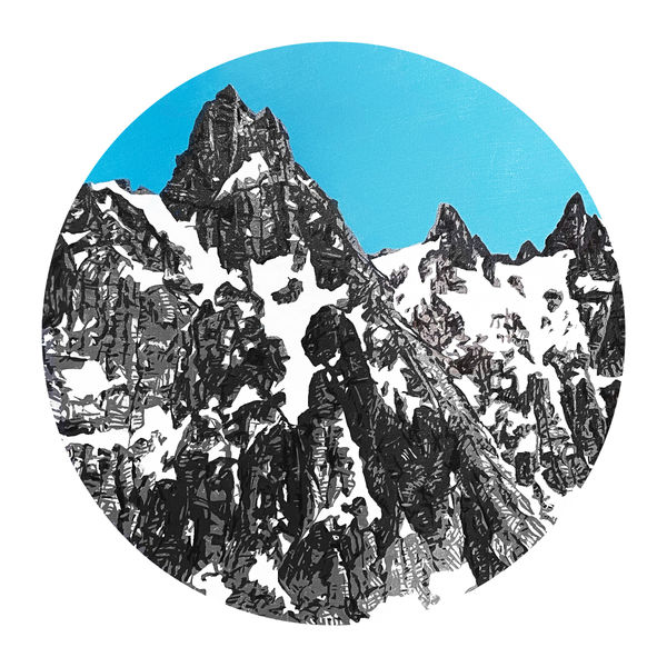 Circular painting of a snow covered mountain against a bright blue background