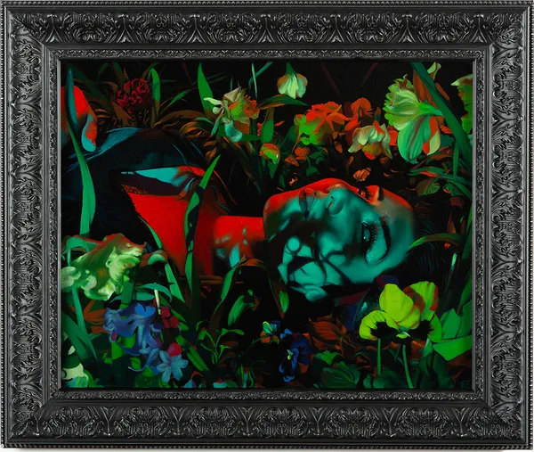 Framed painting of a woman laying on the ground surrounded by plants under red and green lighting