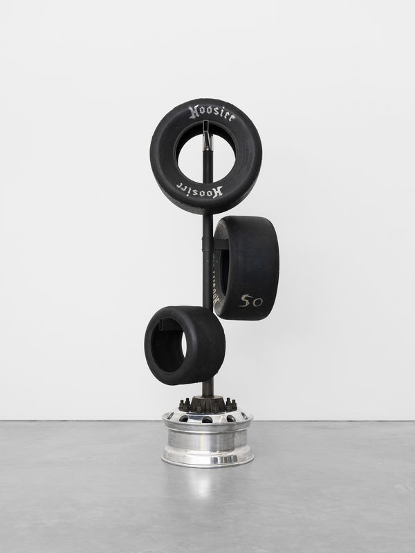 Xavier Mary Wheel of Pain (Hoosier version), 2014-2024 Mirror polished truck rim, powder coated steel tubes, drag racing tire, mirror effect spray paint 230 x 100 x 100 cm. 90 1/2 x 39 3/8 x 39 3/8 in.