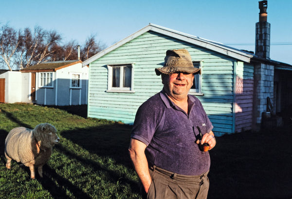 Robin Morrison, Norm Smith with his pet sheep Pebbles. Greenpark Huts, Canterbury, 1979