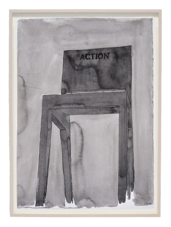 Framed ink drawing of simple wooden chair with 'Action' inscribed on the seat back