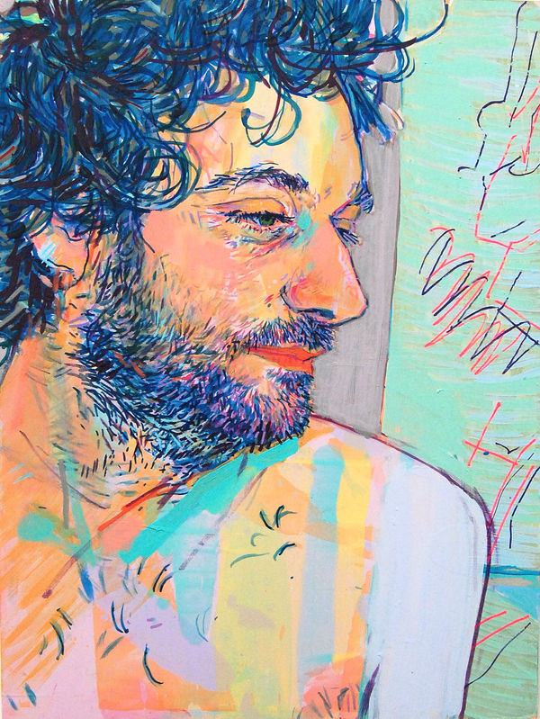 Profile view of man with curly hair looking over his shoulder