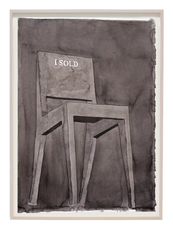 Framed ink drawing of simple wooden chair with 'I Sold' inscribed on the seat back